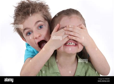 Children Playing Peek A Boo Stock Photo Alamy