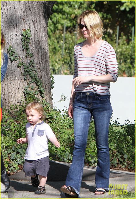 Photo January Jones Xander Walks In Front Of Mommy 20 Photo 2869214 Just Jared