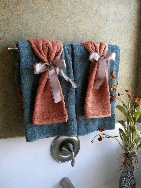 Cute Ways To Hang Towels Bathroom Towel Decor Coral Bathroom Decor