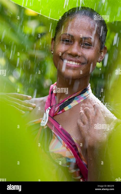 Portrait Of A Woman Enjoying Rain Shower Stock Photo Alamy