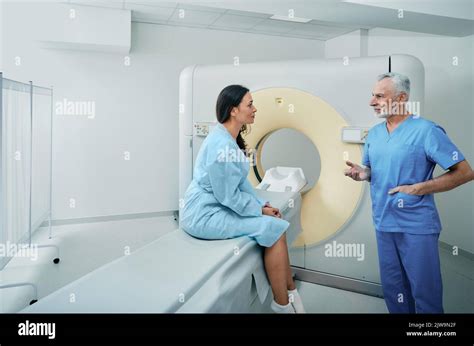 Computed Tomography Medical Professional Talking With Female Patient