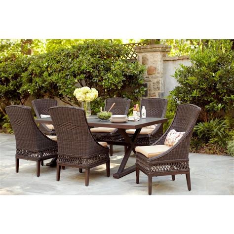 All it takes to transform a deck or patio from a blank space into an inviting outdoor retreat is the right patio furniture and a little style. The Hampton Bay Woodbury 7-Piece Patio Dining Set with ...