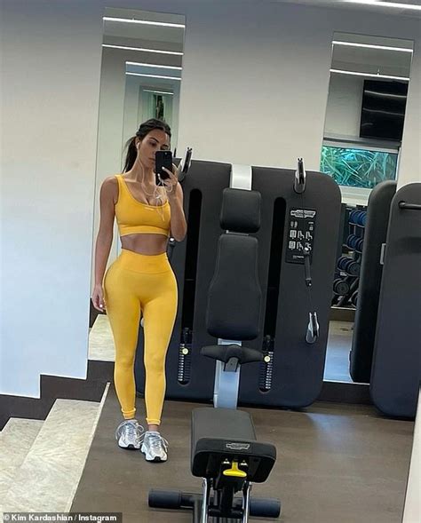 Kim Kardashian Looks Flawless As She Shows Off Her Sculpted Curves In Yellow Workout Set Daily