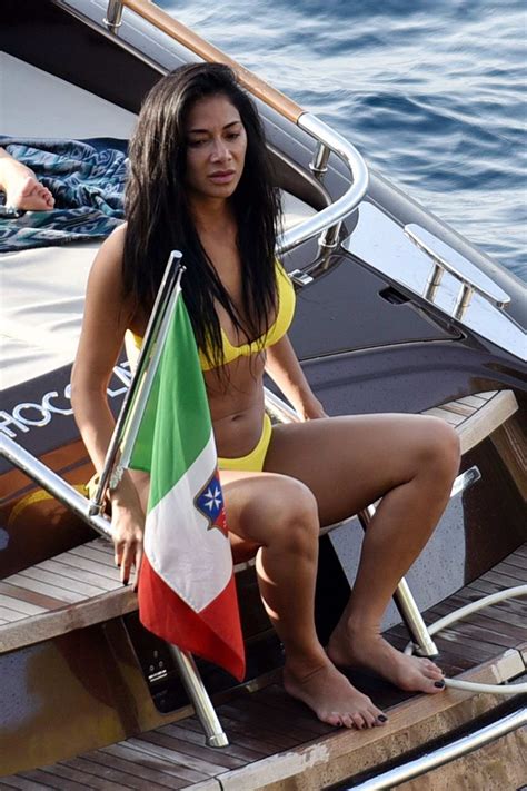 Nicole Scherzinger Wears A Yellow Bikini While Relaxing On A Yacht With Friends In Capri Italy
