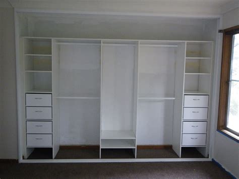 Immaculate White Open Closet Cabinet With Shoes Shelves And Clothing