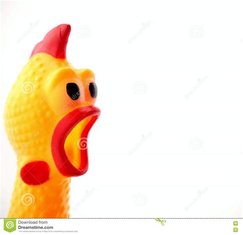 Shocked Chicken Toy Is Isolated On A Pastel Pink Background Looks Into