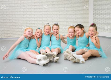 Group Of Cute Little Ballet Dancers Having Fun At Dance School Class