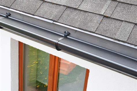 How To Install Gutter Guards For Hassle Free Home Maintenance Bob Vila