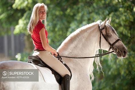 Pure Spanish Horse Andalusian Smiling Woman Riding On The Stallion