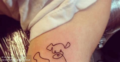 Continuous Line Drawing Style Dog Tattoo On The Bicep