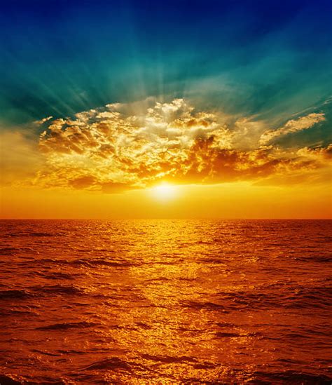 Sunset Over Water Stock Photos Pictures And Royalty Free Images Istock