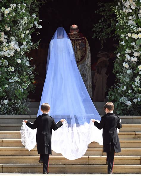 It was meghan markle's wedding dress. Prince Harry and Meghan Markle - Royal Wedding at Windsor ...