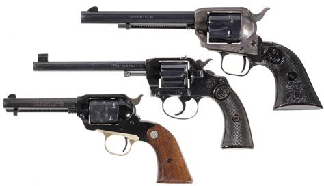 Three Revolvers A Colt Peacemaker 22 Single Action Revolver Rock