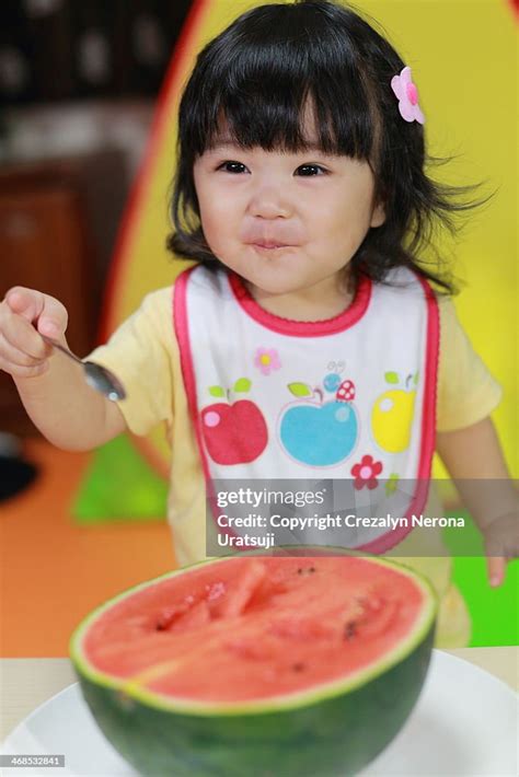 Baby Eating Watermelon High Res Stock Photo Getty Images