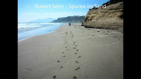 Vor dem dunklen nachthimmel erstrahlten und jedesmal sah ich zwei fußspuren im sand, meine eigene und die meines herrn. Spuren im Sand - Robert Sehn - YouTube