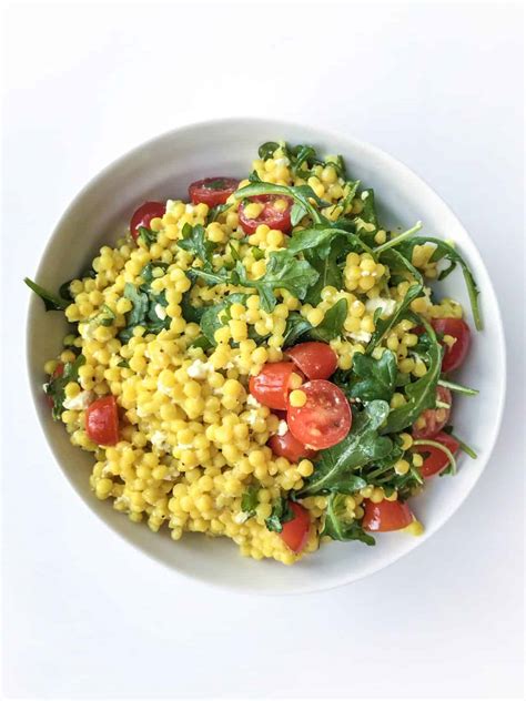 Try our couscous salad recipes for loads of ideas to jazz up your grains with. Turmeric Pearl Couscous Salad - Whitney Aronoff