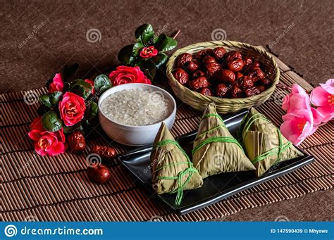 Its current iteration is an people celebrate this holiday by racing dragon boats and eating traditional foods. Dragon Boat Festival Traditional Food Zongzi Stock Image ...