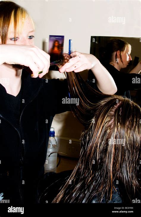 Long Hair Being Cut With Scissors Stock Photo Alamy