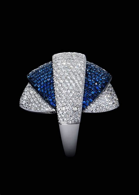 Your resource to discover and connect with armadillo. Armadillo ring in blue and white pavè. #avantgarde #design ...