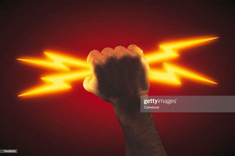 Hand Holding Lightning Bolts Photo Getty Images