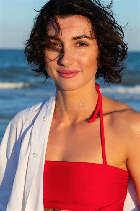 Back Of A Beautiful Woman In Red Bikini On Sea Background Stock Image