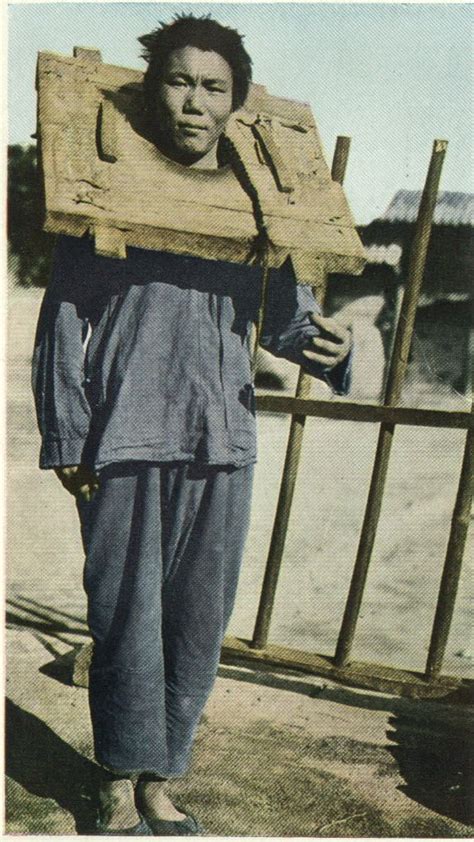 Chinese Man Locked In A Cangue As Punishment A Small Device That Was Used For Public