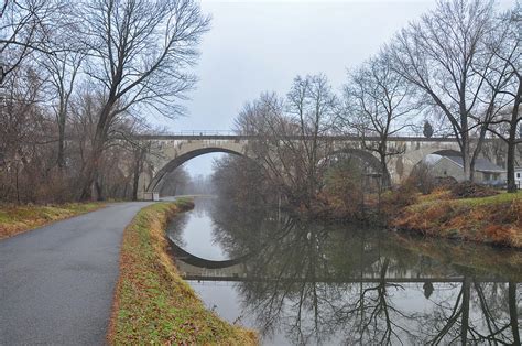 7 am until 1 pm. Phoenixville Pa - The Canal Photograph by Bill Cannon