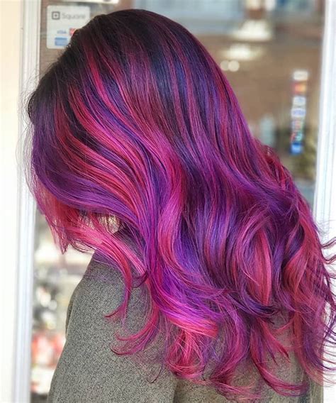 bright pink and purple unicorn hair color but ashton splat hair design in ashland ohio hair