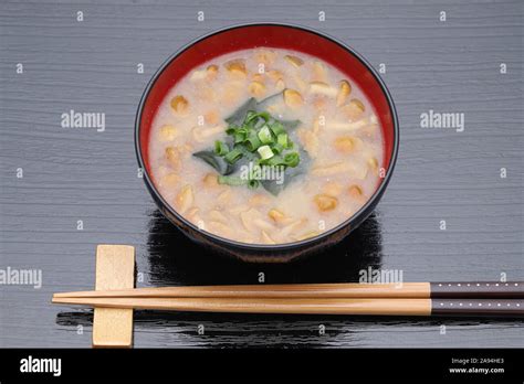 Japanese Food Miso Soup Of Nameko Mushroom And Wakame On A Bowl Stock