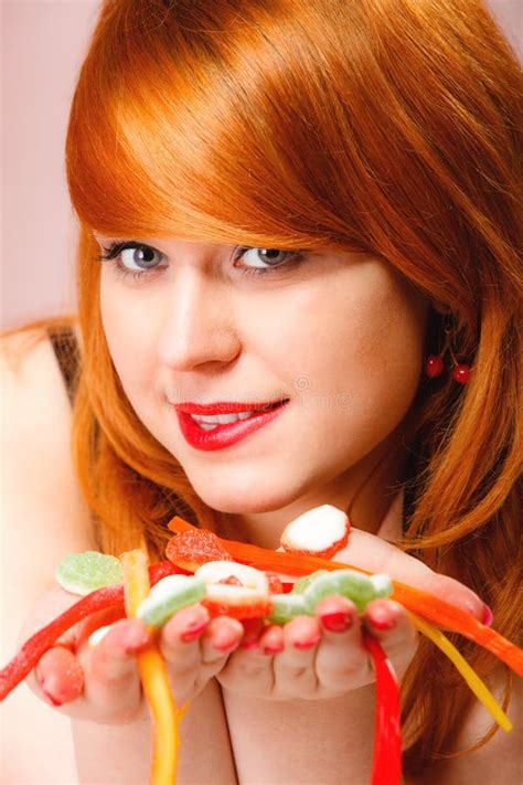Redhair Girl Holding Sweet Food Jelly Candy On Pink Stock Image Image Of Pink Hair 71054913