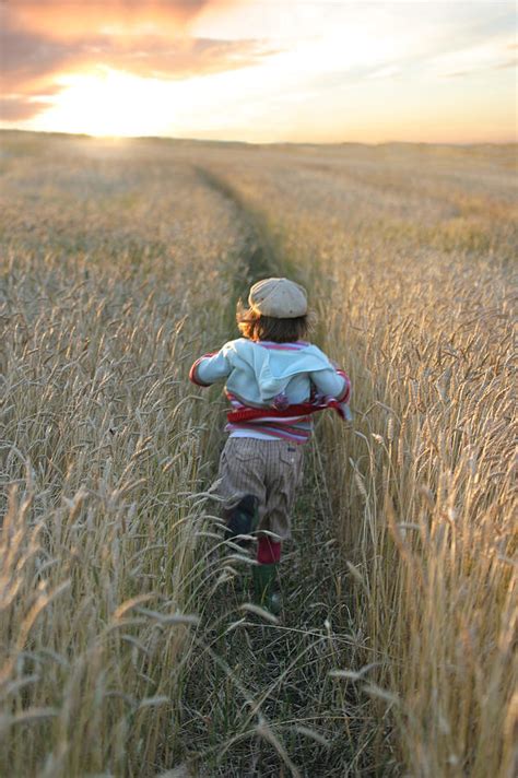 Girl Running Through Wheat Field Photograph By Mirek Weischel Fine