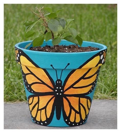 Pot head planters on instagram. Butterfly Pot | I painted this pot for the bougainvillea ...