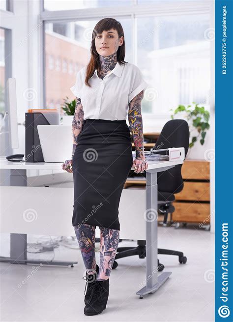Shes Ready To Rock The Corporate Scene A Tattoo Covered Young Businesswoman In Her Office