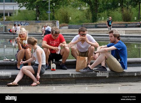 Group Of Friends Eating Chinese Food Outdoors Stock Photo Alamy
