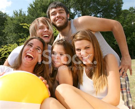 Teenage Friends Laughing Hysterically Together Stock Photo Royalty