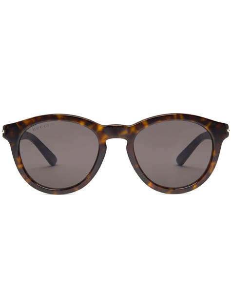 gucci eyewear tortoiseshell effect round frame sunglasses farfetch