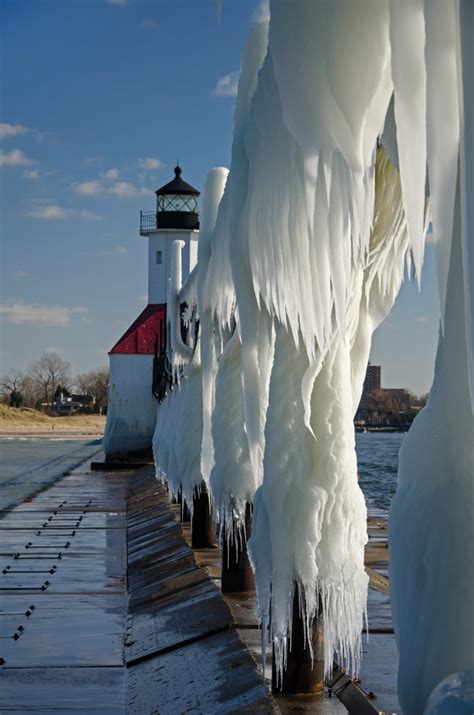 Photographer Tom Gill Captures Stunning Photos Of Frozen Lighthouse On