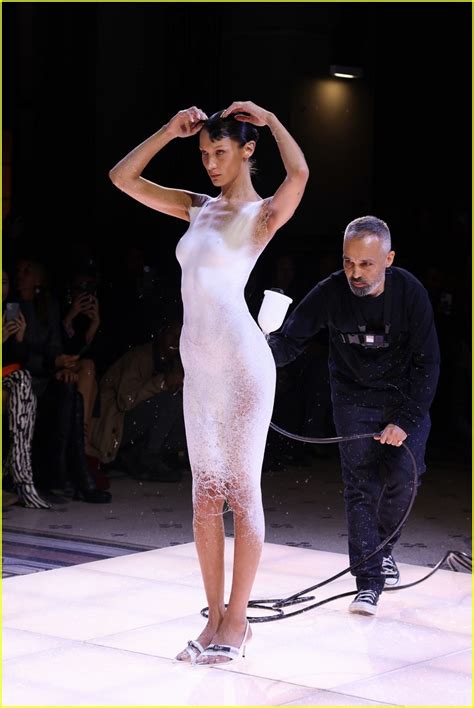 Bella Hadid Has Dress Spray Painted On Her Body During Coperni Show In