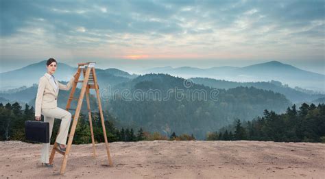 Composite Image Of Businesswoman Climbing Career Ladder With Briefcase