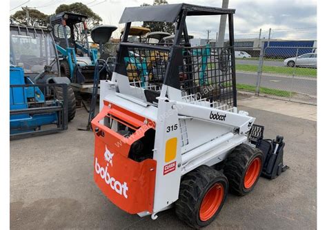 Used Tcm Bobcat 315 With 4 In 1 Bucket Wheeled Skidsteers In Listed