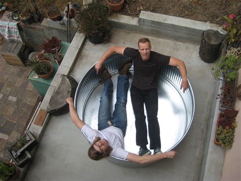As someone who doesn't have a pool i envy you your stock tank one. Stock Tank Installation | GreenFrieda | Flickr