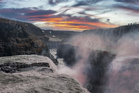 Beautiful Gullfoss Waterfall In Golden Circle Against Cloudy Sky During