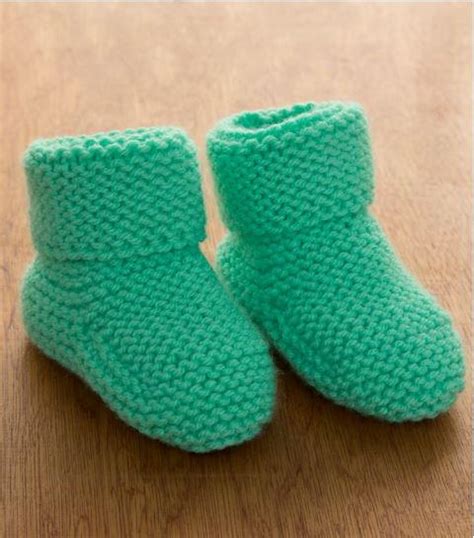 These are baby booties knit flat for ease. Minty Garter Stitch Baby Booties | AllFreeKnitting.com