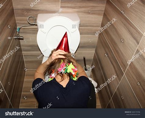 Young Woman Vomiting Into Toilet Bowl Stock Photo Edit Now 1603173706