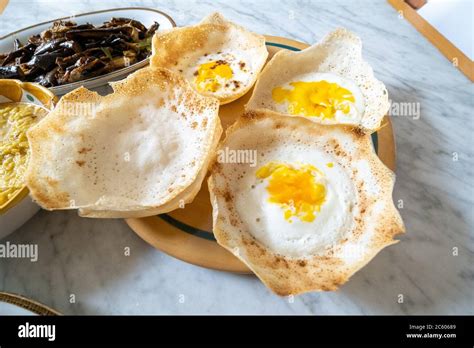 Homemade Srilankan Dishes Egg Hoppersamosas And Eggplantts With Sugar