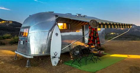 Airstream Atop Hill Provides Panoramic View And Rustic Interior With