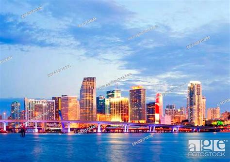 City Of Miami Florida Summer Sunset Panorama With Colorful Illuminated