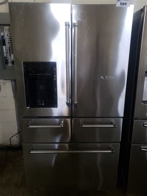 What kind of refrigerator has two side by side doors? KITCHEN AID FRENCH DOOR FRIDGE MODEL # KRMF606ESS01 HAS ...