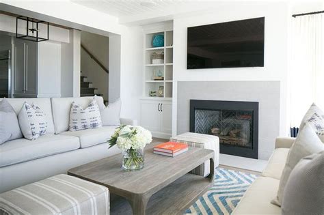 It is a family room and will mostly be used to hang out as family and watch tv so sectional makes more sense. Two Living Room Sofas - Cottage - Living Room