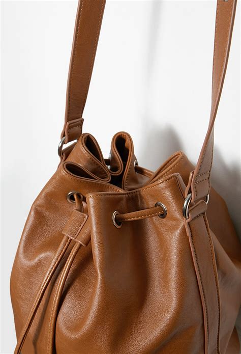Lyst Forever 21 Faux Leather Drawstring Bucket Bag In Brown